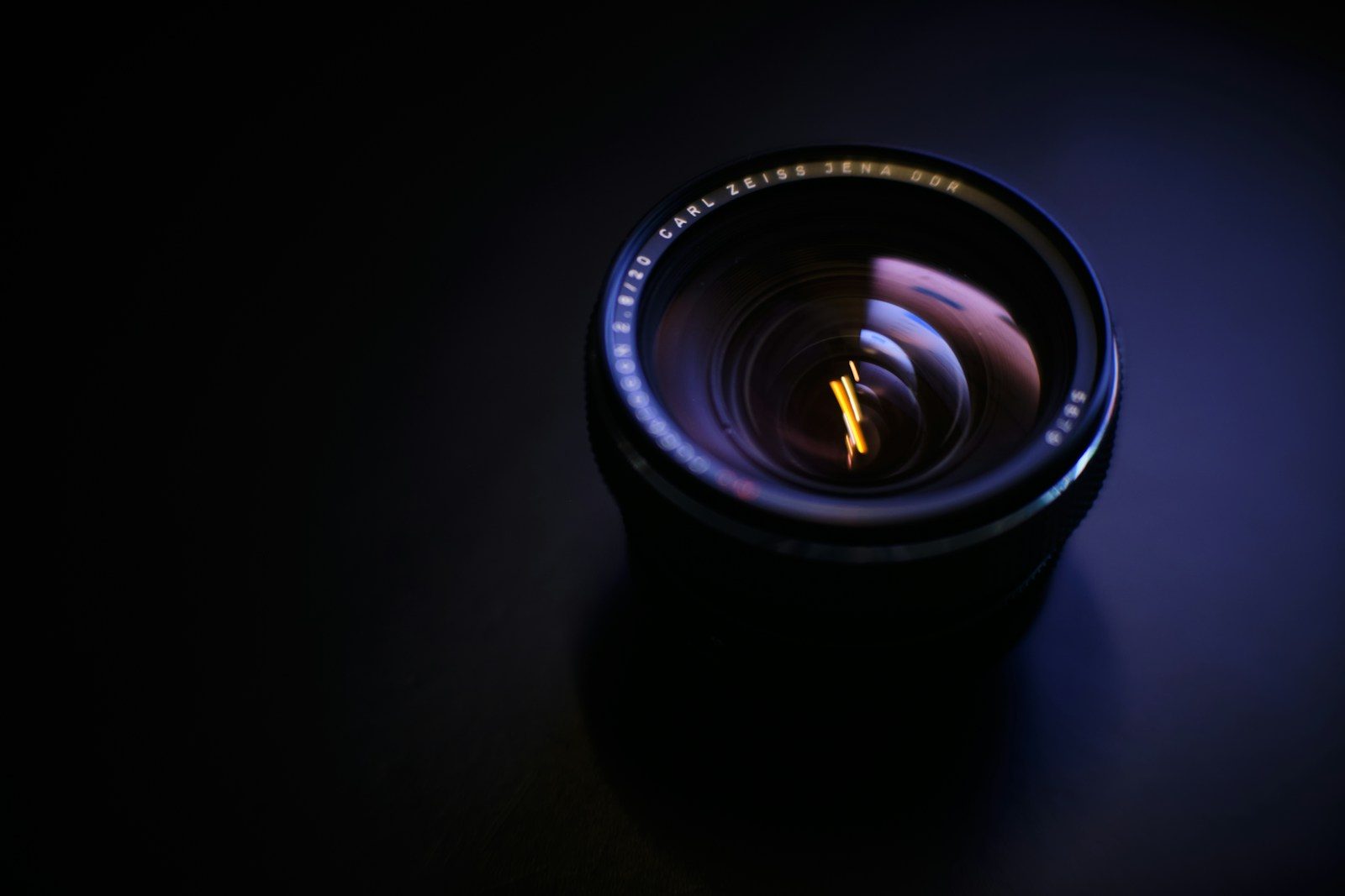 a close up of a camera lens on a table