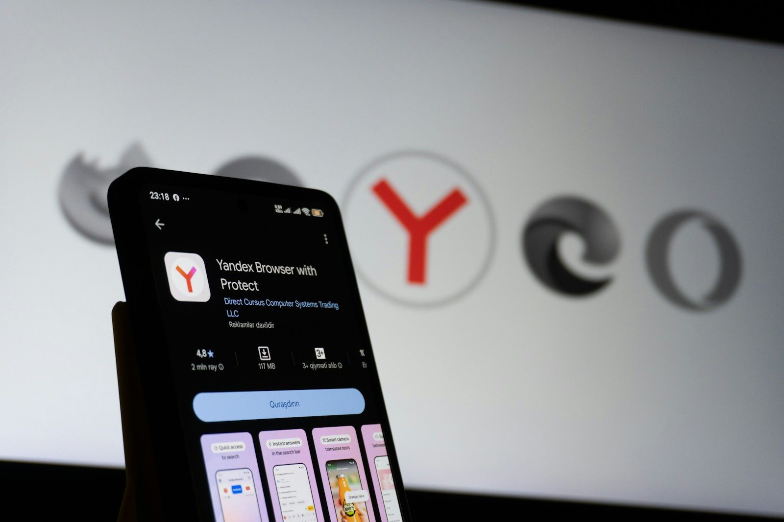 Smartphone displaying yandex browser app with yandex logo.