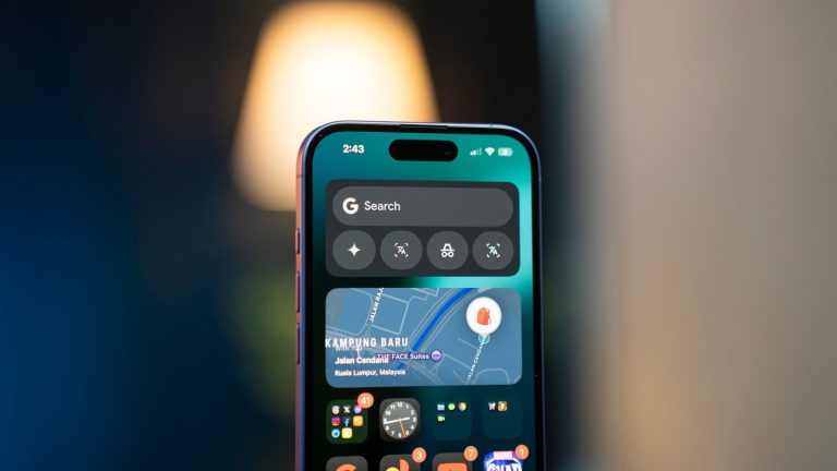 A close up of a person holding a cell phone