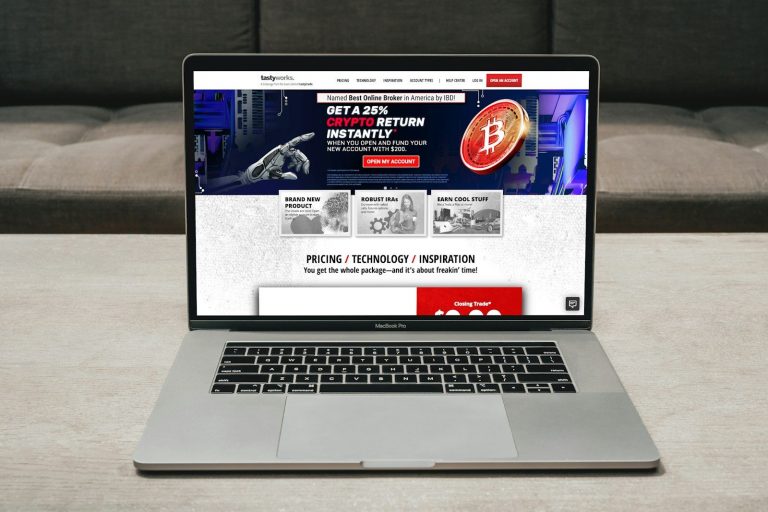 a laptop computer sitting on top of a table