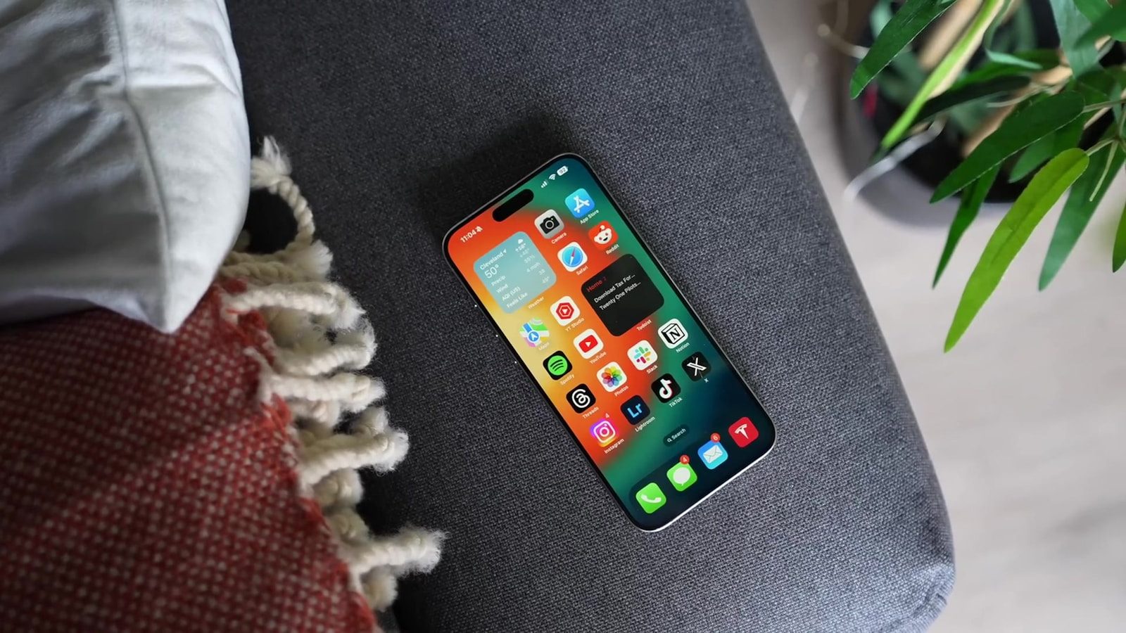 A remote control sitting on top of a couch